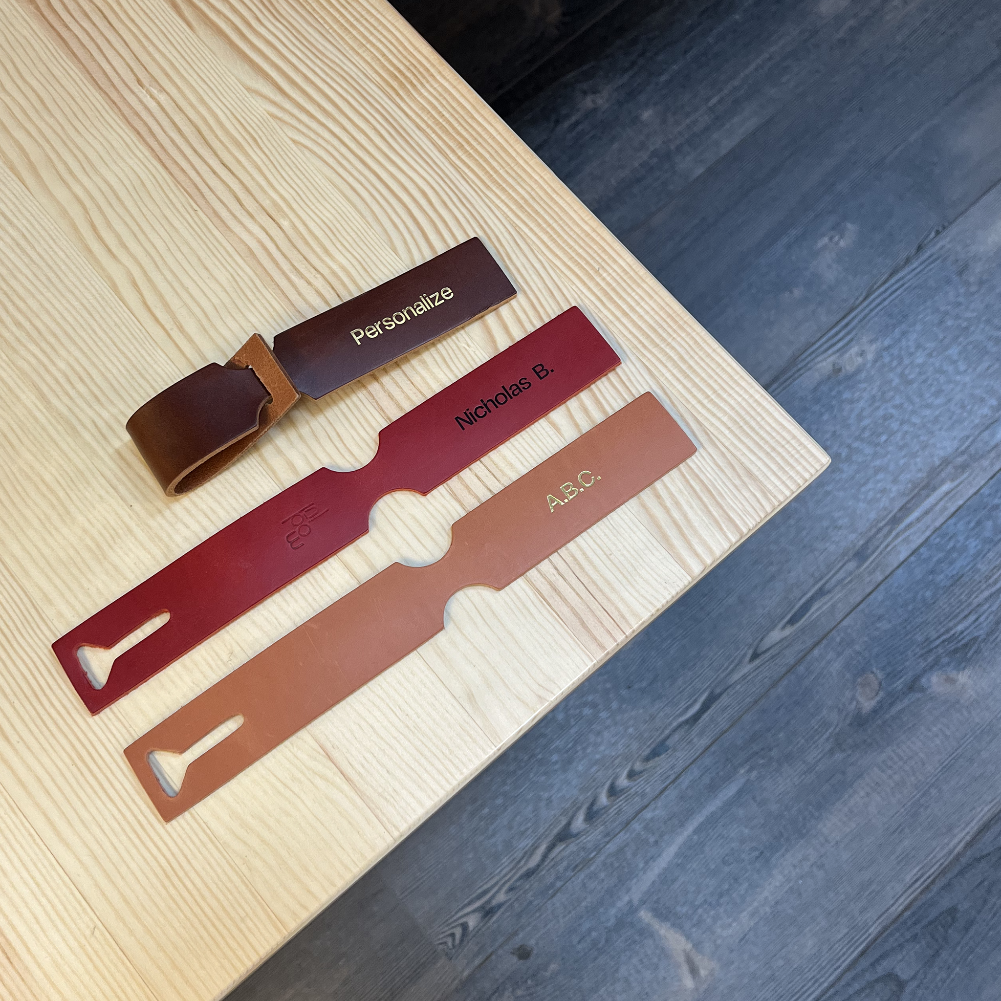 The modjūl leather luggage tag personalization options embossed on leather.