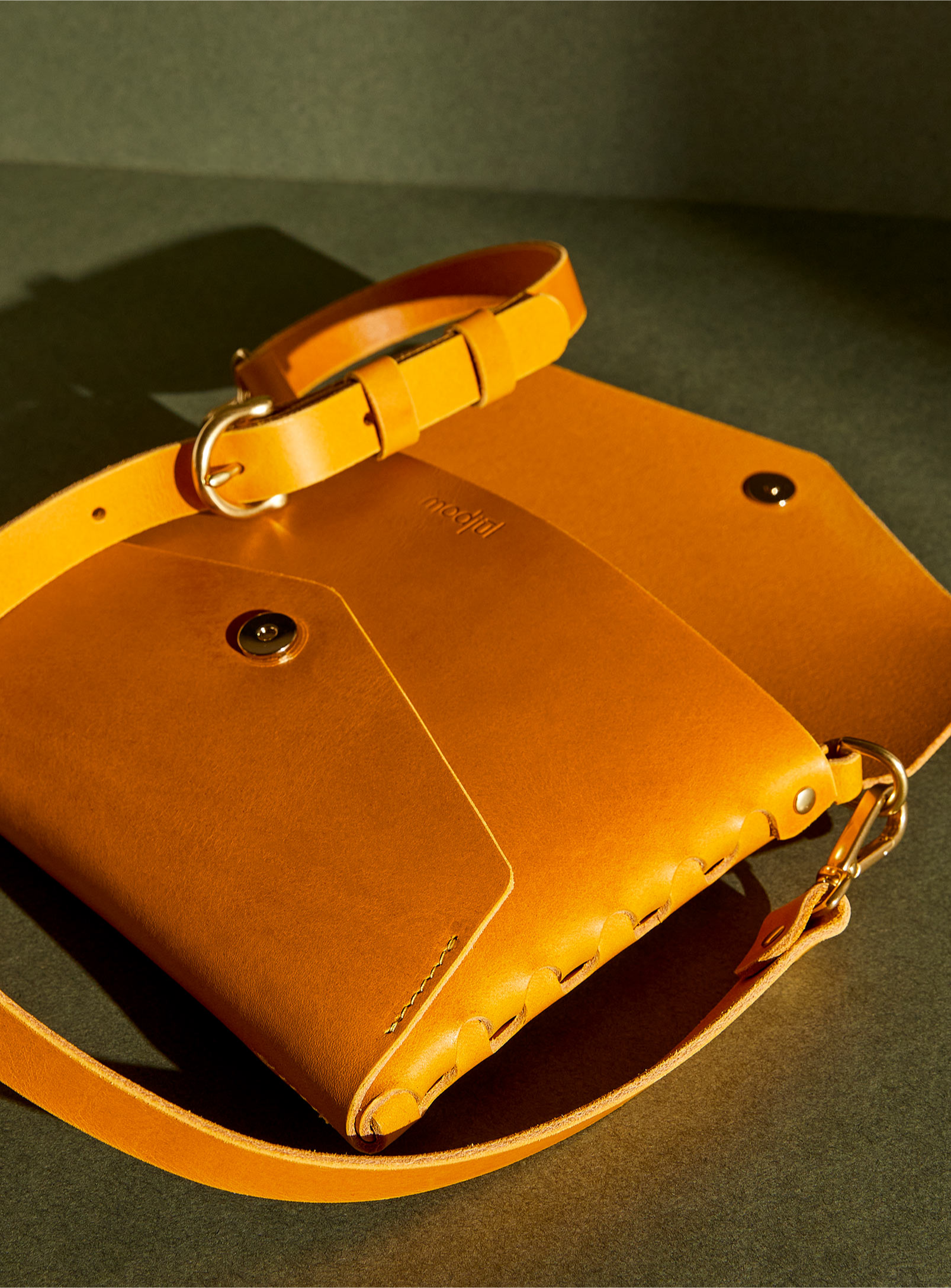 opened modjūl leather envoy bag in yellow, made in canada