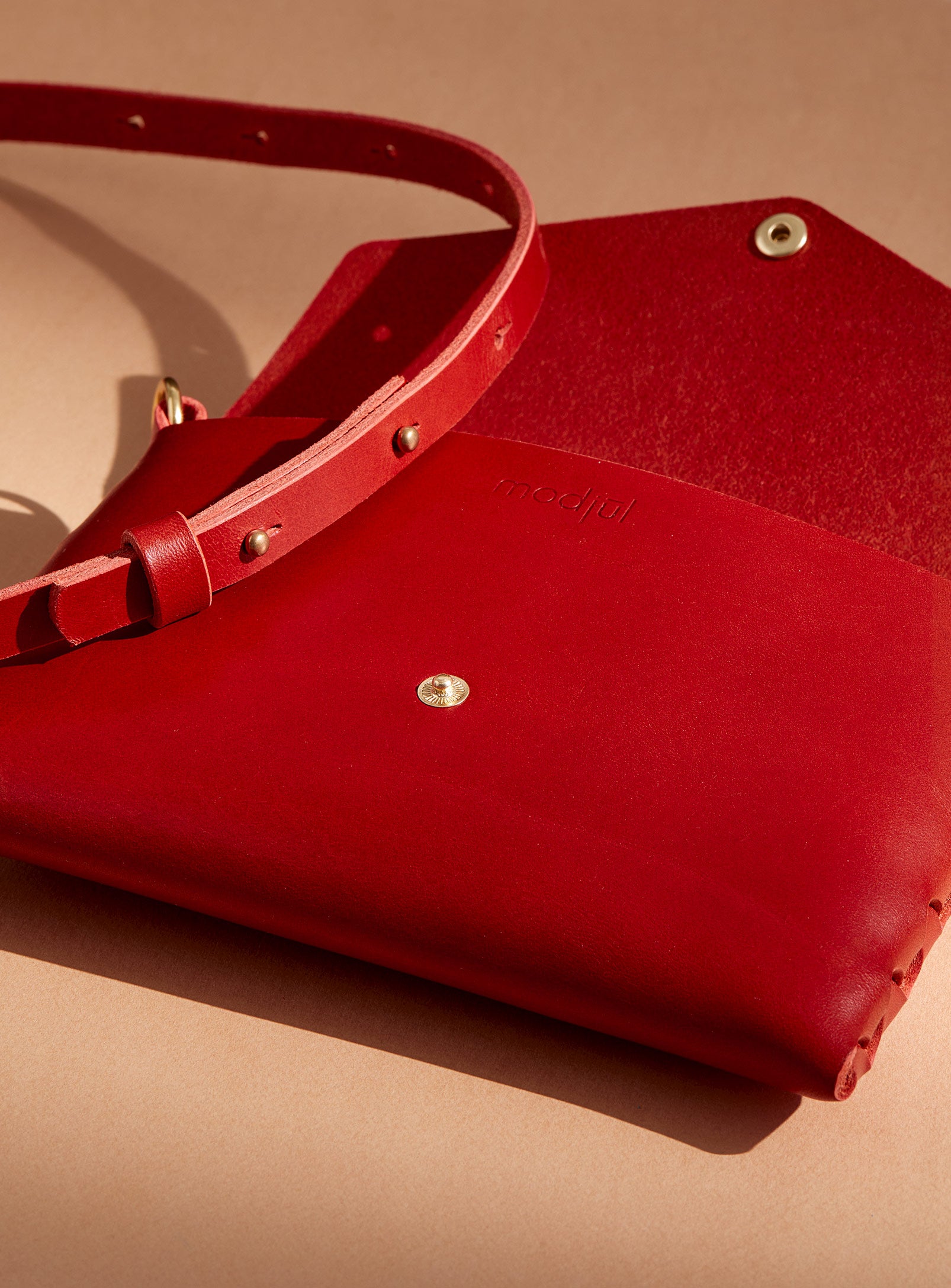 the inside of the modjūl mini bag in red. Handmade in Newfoundland, Canada.