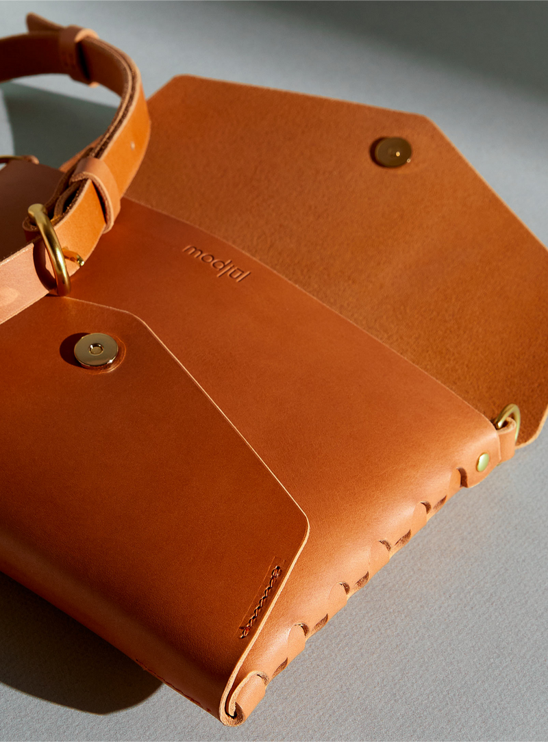 opened modjūl leather envoy bag in camel, made in canada