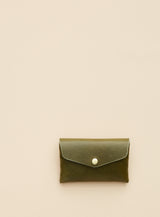 modjūl's classic pouch in olive colored leather. A compact open wallet with endless possibilities, perfect for holding cards, keys or loose change. Handmade in Canada and joined with the signature modjūl joinery and quality brass hardware.