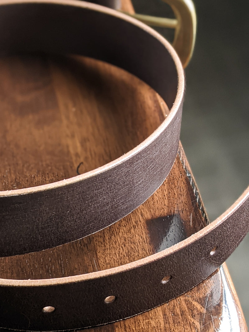 Close-up of premium Italian leather belt, handmade by modjūl studio in Canada.